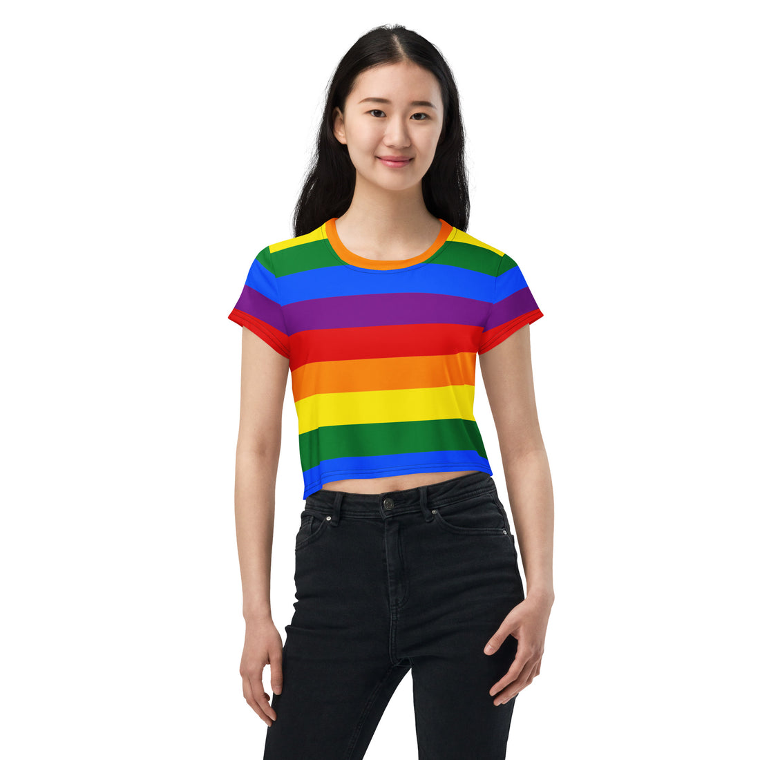 Rainbow Pride Crop Tee with vibrant rainbow stripes displayed on a neutral, studio-style background. The tee features a cropped cut and a bold Pride design, symbolizing LGBTQ+ inclusivity and celebration. Perfect for casual and pride-themed outfits.